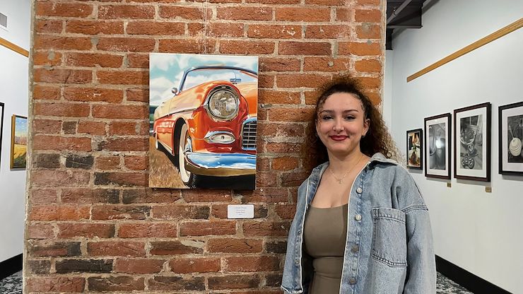 The Best in Show Award, sponsored by the Pottstown Area Artist’s Guild, was presented to Imane Fares for her oil painting, Chrome Dreams. Photo by Diane VanDyke