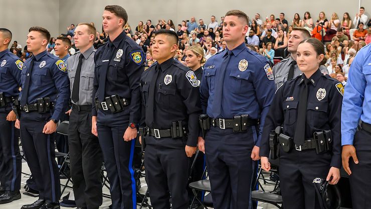 Graduating Montgomery County Community College Municipal Police Academy cadets stand at attention during the program’s June 11 graduation ceremony. Thirty-nine new officers completed the program. Photo by Linda Johnson