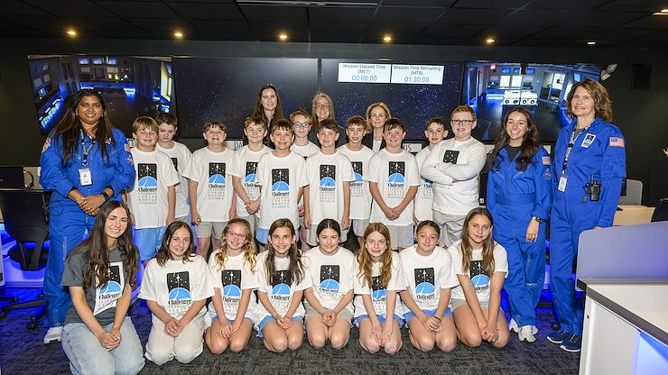 Congresswoman Madeleine Dean joined Montgomery County Community College President Dr. Vicki Bastecki-Perez (center) and fifth-grade students from St. Teresa of Calcutta School in Schwenksville at the Challenger Learning Center at Montco Pottstown on April 24 to commemorate Challenger Center’s 40th anniversary. MCCC recently received $500,000 in federal funding to continue the Challenger legacy. Photo by Linda Johnson