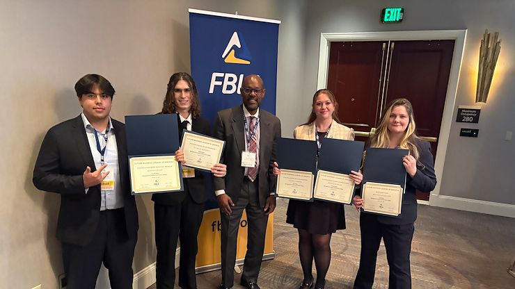 From left: Jeremy Grady, Patrick Hennessy, Damon Gray, Sloane Harker and Brittany Hamilton. Montgomery County Community College Future Business Leaders of America Club took some of the top prizes at FBLA’s 54th annual Collegiate Chapter Conference in Harrisburg March 27 and 28. Photo by Damon Gray