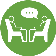 Graphic icon of two individuals sitting down and talking