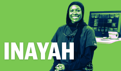 How Do You Montco - Inayah Image of Inayah smilling in front of a Dental X-Ray computer