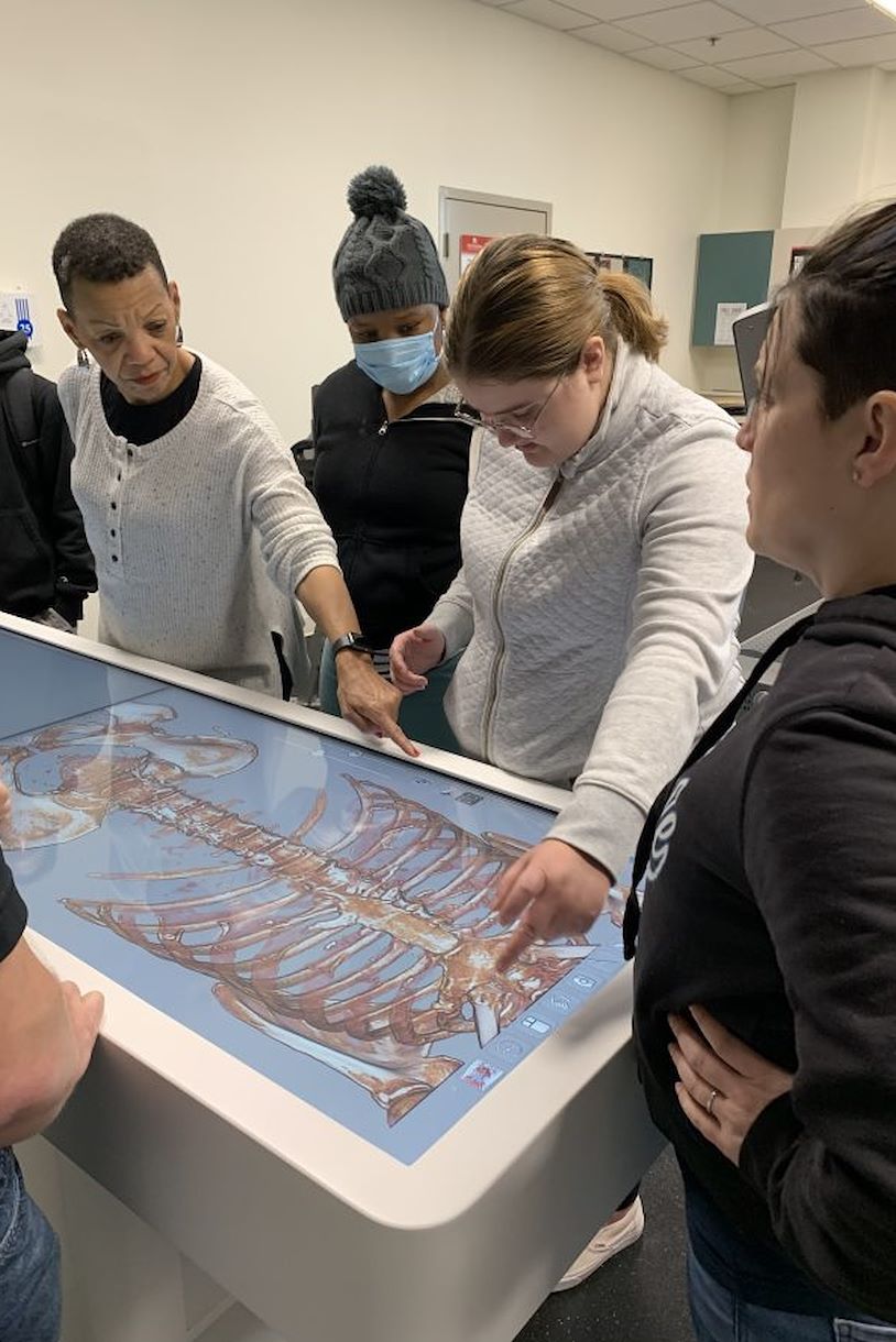 Students interacting with Anatomage Table