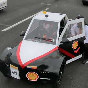 INNOVA project car being serviced on a track 