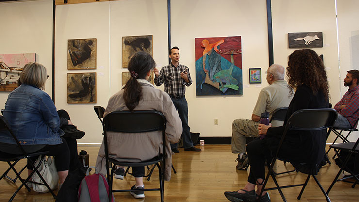 Kurt Kindermann discusses his art with Montco students and community members.