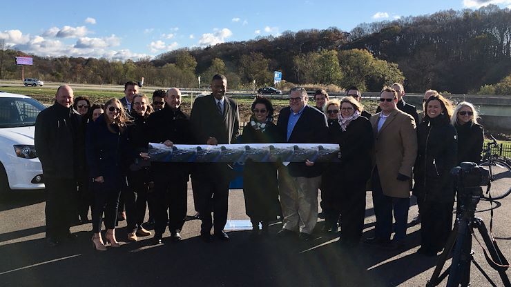 More than 40 area officials gathered in a parking lot to launch the 422 My Way Campaign to find innovative solutions to reducing traffic congestion. Montgomery County Community College uses a shuttle service from Greater Valley Forge Transportation between its campuses in Pottstown and Blue Bell, which helps to alleviate traffic.