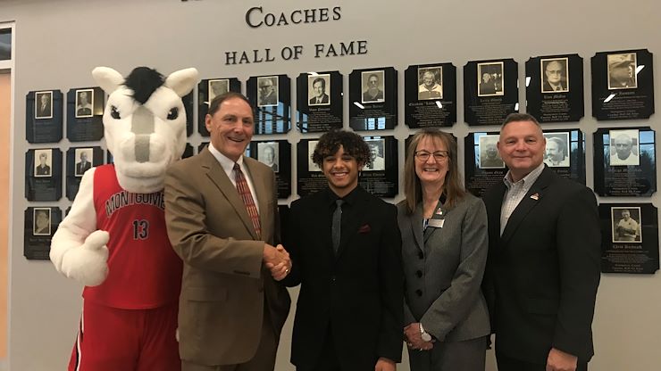 The Montgomery County Coaches Hall of Fame Board of Directors awards a $2,000 scholarship to Montgomery County Community College student Avian Garcia of Hatfield. From left: Dale Hood, Montgomery County Coaches Hall of Fame President; Avian Garcia, MCCC student; Dr. Victoria Bastecki-Perez, MCCC Interim President; and Jay Browning, MCCC Vice President for Advancement. Photo by Matthew Moorhead