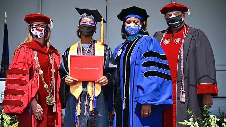 Montgomery County Community College's Class of 2021 has 1,146 graduates who earned a total of 1,168 degrees and certificates. Abigail Brand, 15, of Gilbertsville, was the student commencement speaker. From left: Dr. Victoria L. Bastecki-Perez, MCCC President; Abigail Brand; Dr. Gloria Oikelome, MCCC Vice President for Academic Affairs and Frank X. Custer, Chair, MCCC Board of Trustees. Photo by David DeBalko