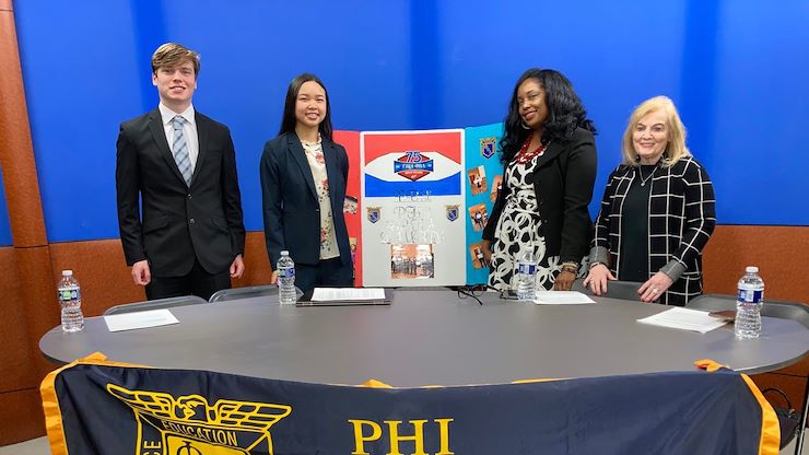 From left, students Zachary Raugh and Amie Wildermuth with Montgomery County Community College Board of Trustees members Anisha Robinson Keeys and Eleanor Dezzi. For the Phi Beta Lambda State Competition, the students hosted a panel discussion with the trustees as a community service project for Women's History Month. The trustees spoke about their careers, leadership roles and diversity, equity and inclusion. Photo by Eric Devlin