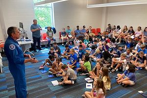 Retired NASA Astronaut Dr. Donald A. Thomas talks to Janet's Planet campers.