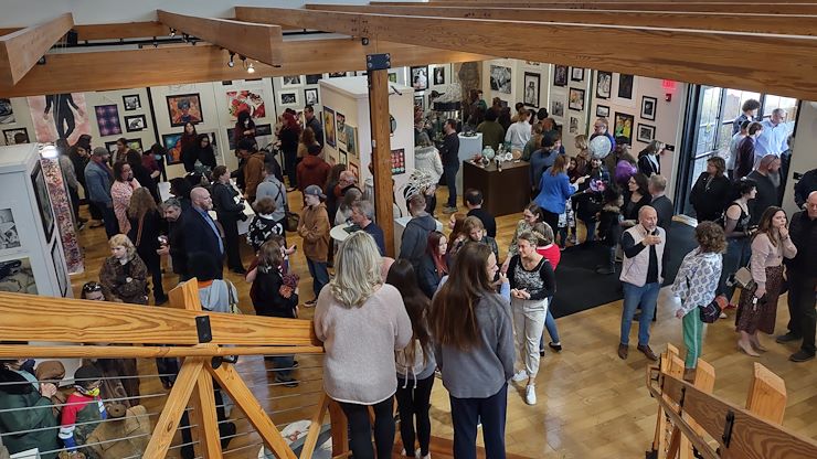 More than 250 people attended the opening reception for the "Touch the Future" Art Show on March 5 at the Blue Bell Campus. The show features the artwork of students from 26 schools in Bucks and Montgomery counties. Photo by Patrick Rodgers