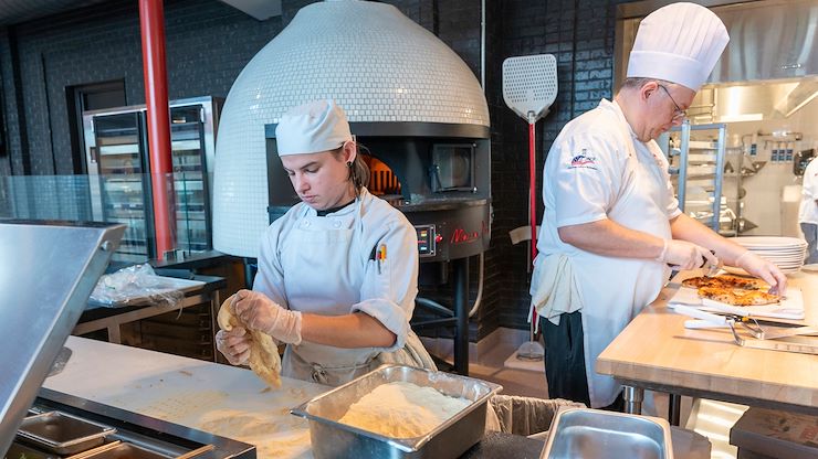 Students studying in the Culinary Arts Program located in the Hospitality Institute on Montgomery County Community College’s Blue Bell Campus work in a state-of-the-art facility and learn from industry experts. The Hospitality Institute will be open for prospective students during a campus-wide spring open house April 26. Photo by Linda Johnson