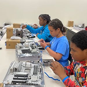 students working on the motherboard