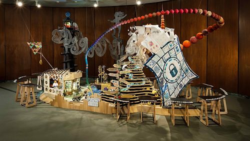 The Mathemalchemy exhibit includes fiber arts, illustration, sculpture, glass and wood components.