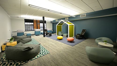 The sensory room in the Wellness Center on the Pottstown Campus featuring low tables and soft chairs. 