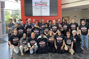 Students attending the Muscle Shoals Residency gather in the atrium of the Advanced Technology Center
