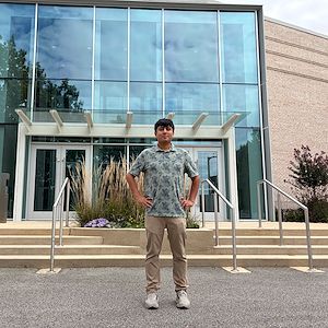 Heber Herrera stands outside the Science Center on Montgomery County Community College’s Blue Bell Campus. 
